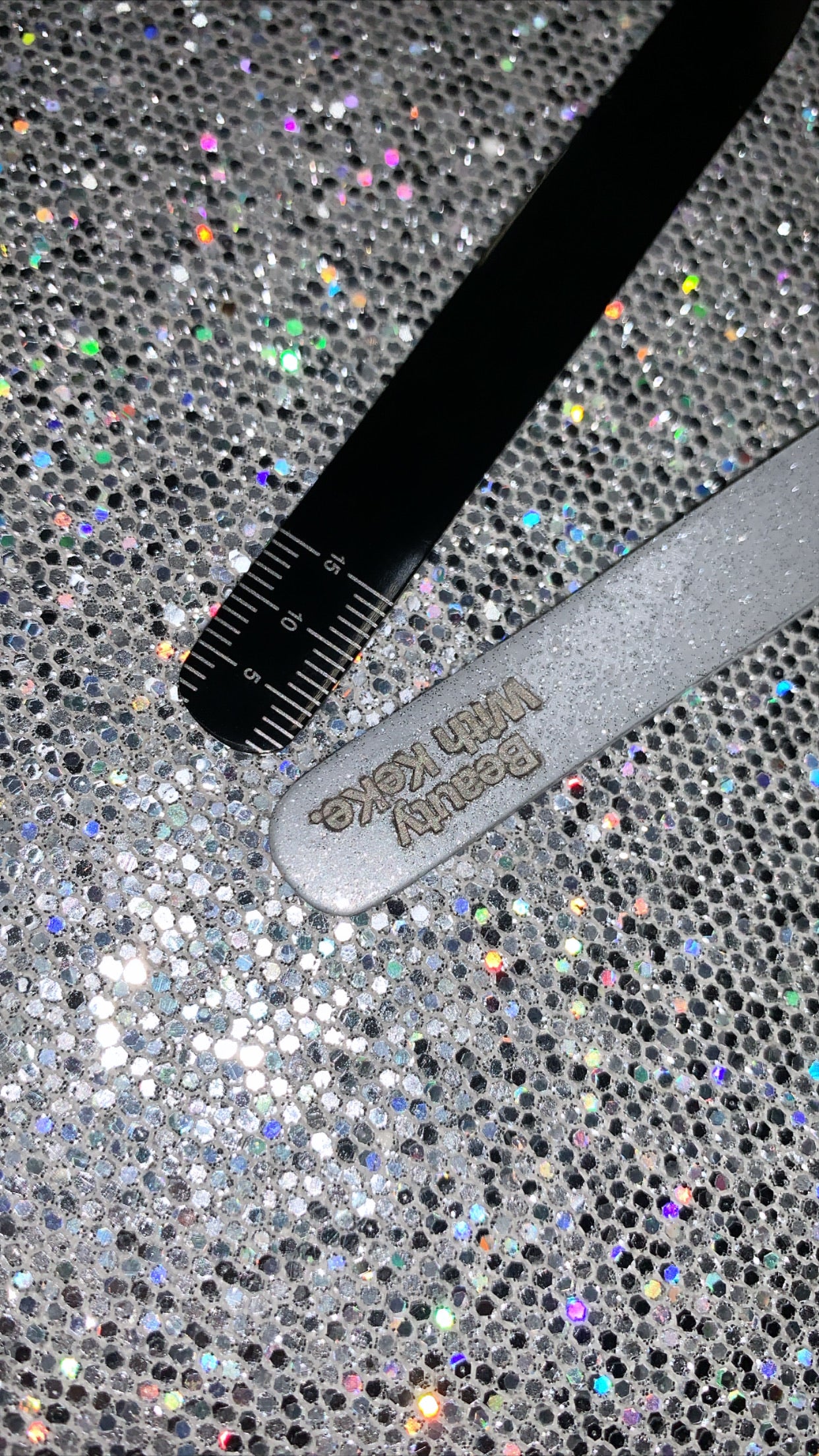 RULE The World Tweezer